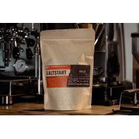 KALTSTART coffee, whole bean, in front o gallery